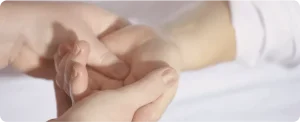Senior performing home care physiotherapy