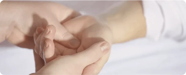 Senior performing home care physiotherapy
